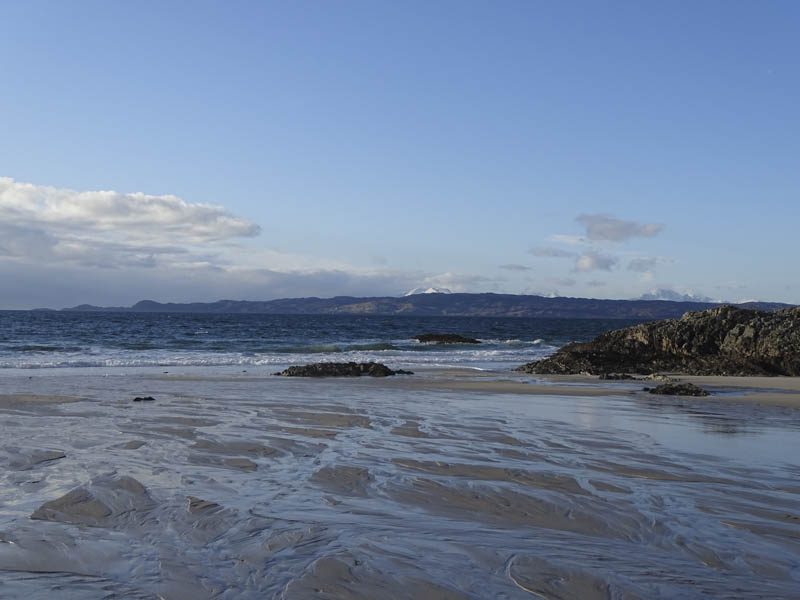 Sound of Sleat. Snow topped Cuillin Range in far distance