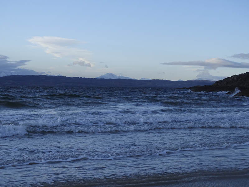 Sound of Sleat. Snow topped Cuillin Range in far distance