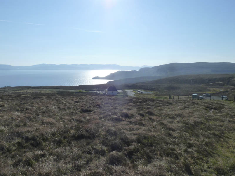 Knockbreck Primary School and sun shining on Loch Snizort