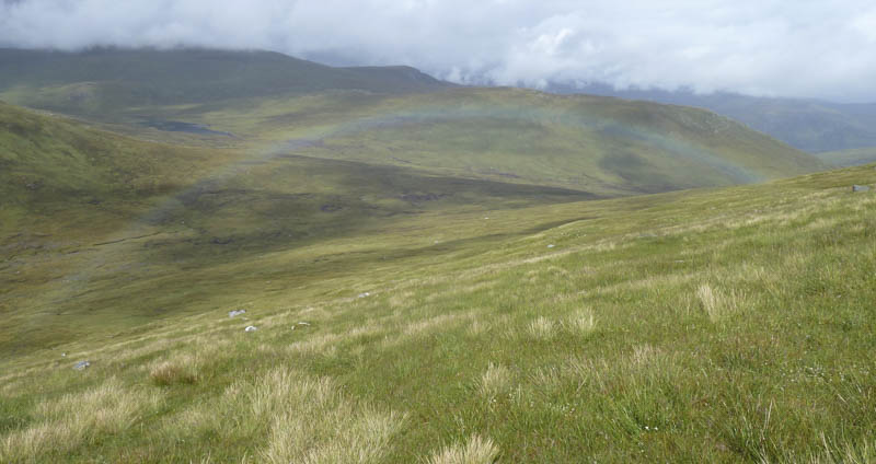 Rainbow. Creag Tharsuinn behind