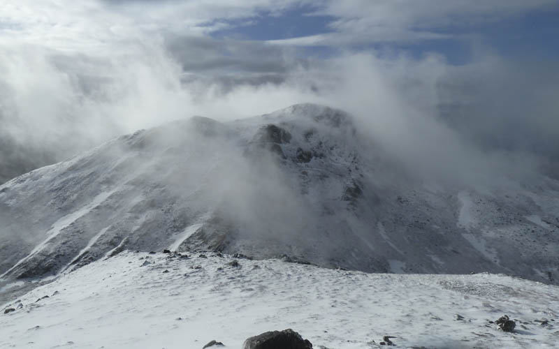 Cloud lifting to reveal Sgurr na Coinnich