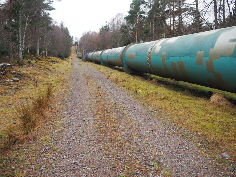 Route up side of pipeline